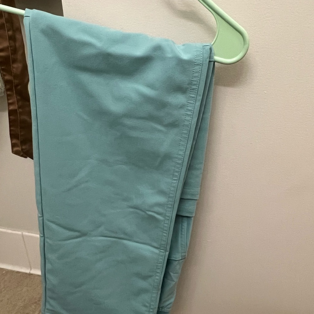 Figs (limited edition color: sea glass) cus pants. Never been worn.